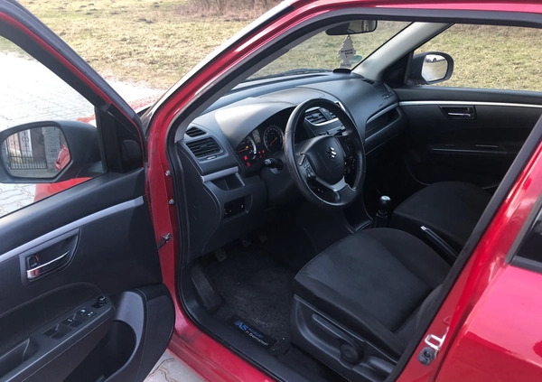 Suzuki Swift cena 23499 przebieg: 143979, rok produkcji 2012 z Czersk małe 631